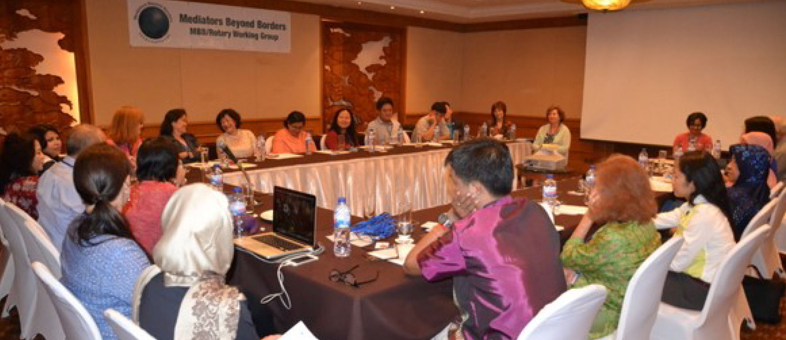 Women of various nationalities in a conference Women of various nationalities in a conference