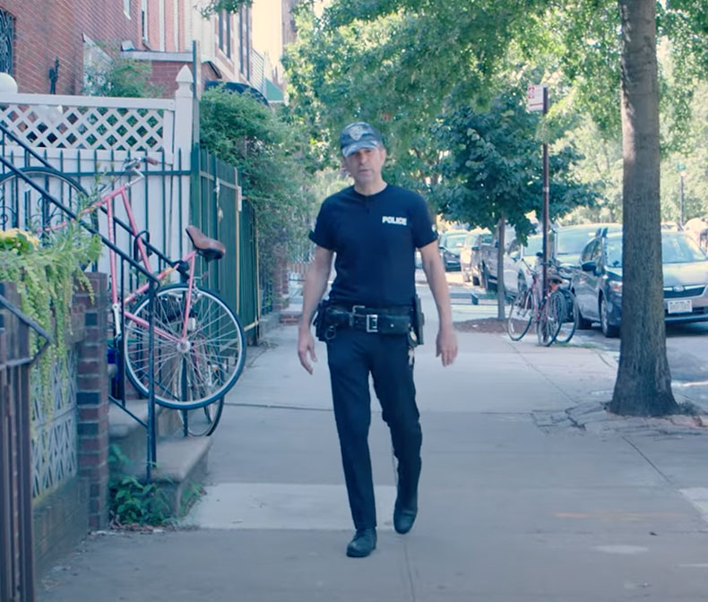 Video screen with a police officer