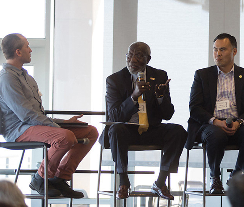 Speakers at a conference